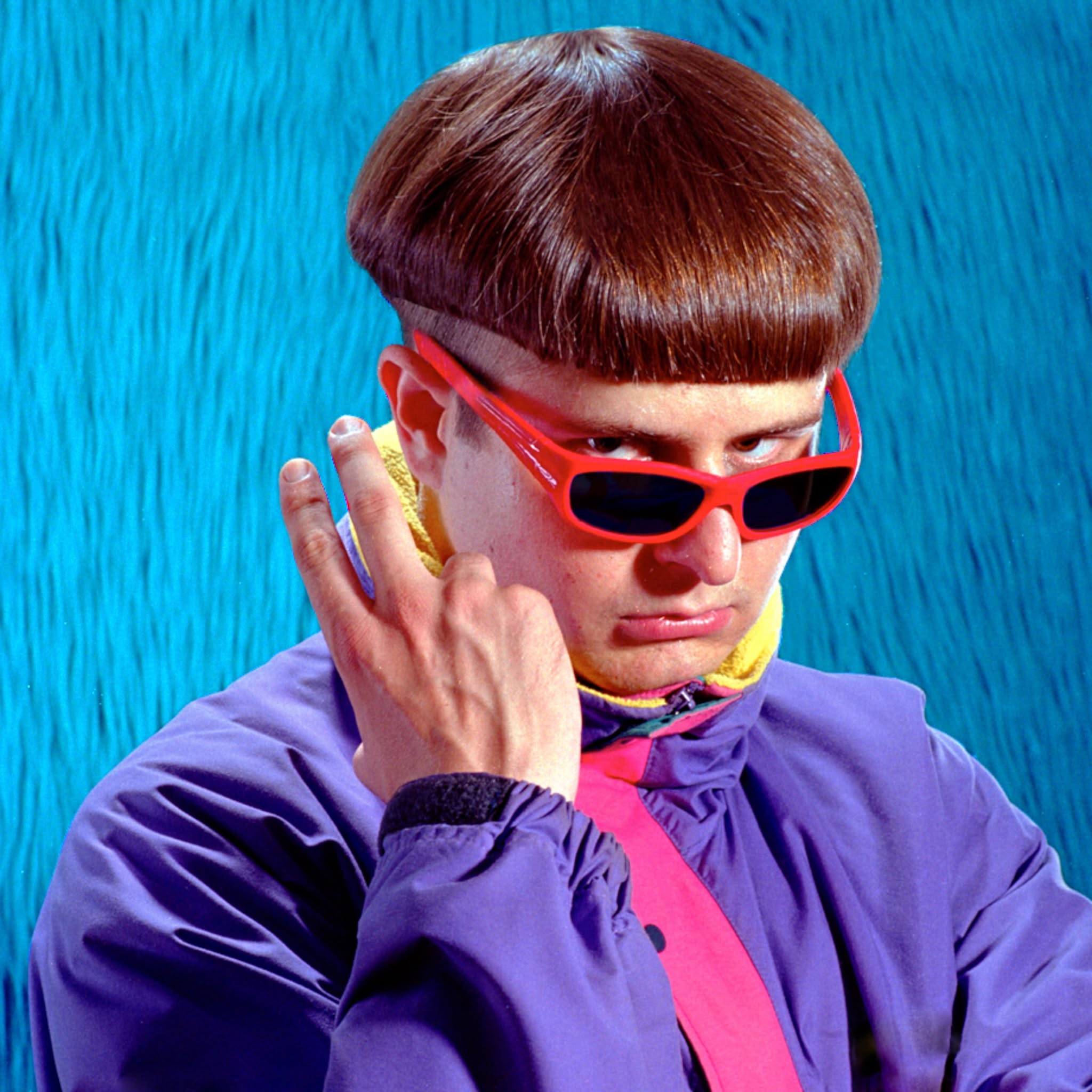 Oliver Tree in red sunglasses and purple jacket