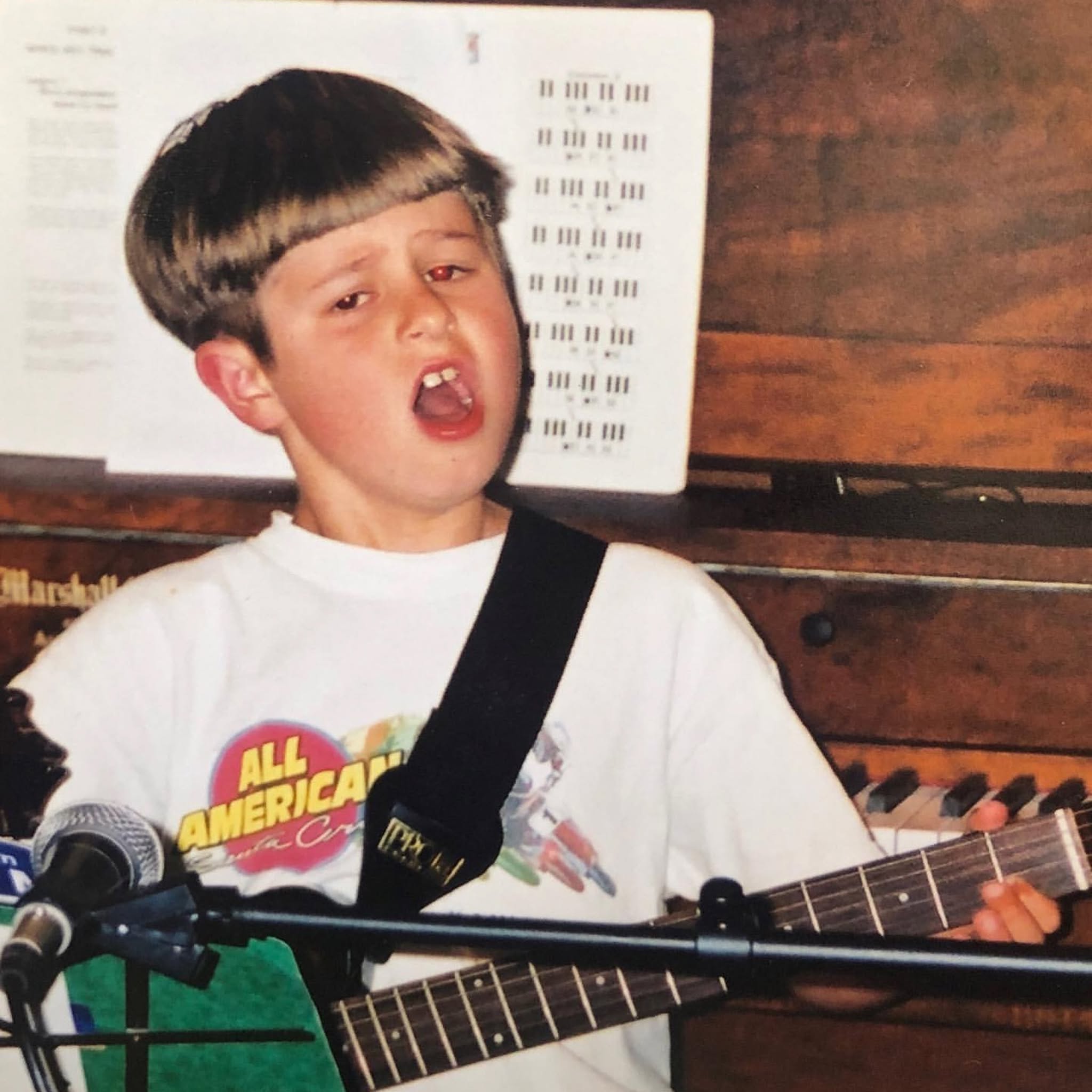 Young Oliver Tree playing guitar